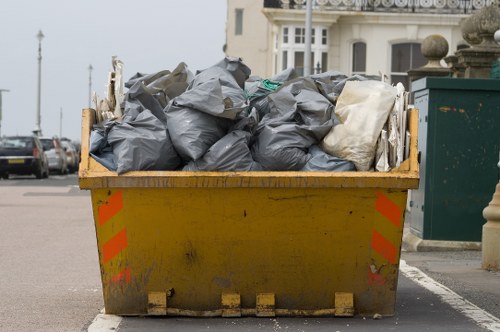 Professional house clearance team working in a Newham home